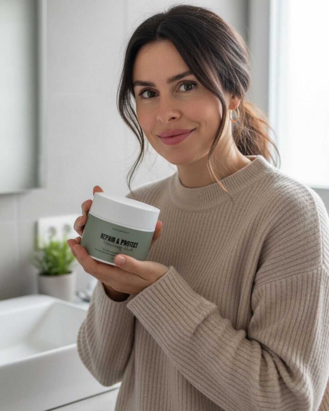 Woman holding a Patea mask in a bathroom setting